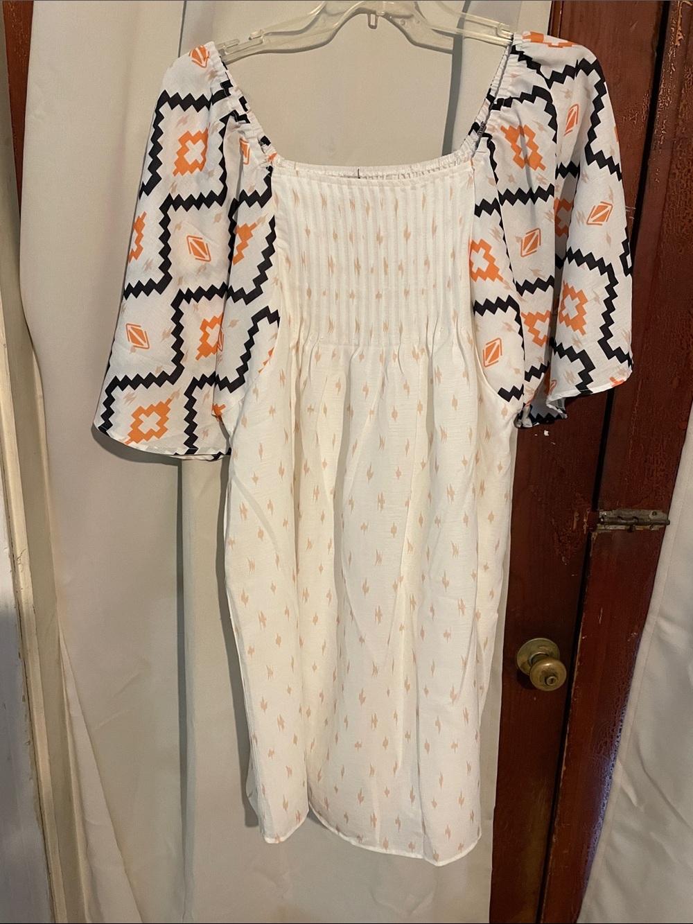 Smocked White Casual Dress with Orange & Black Sleeve Print